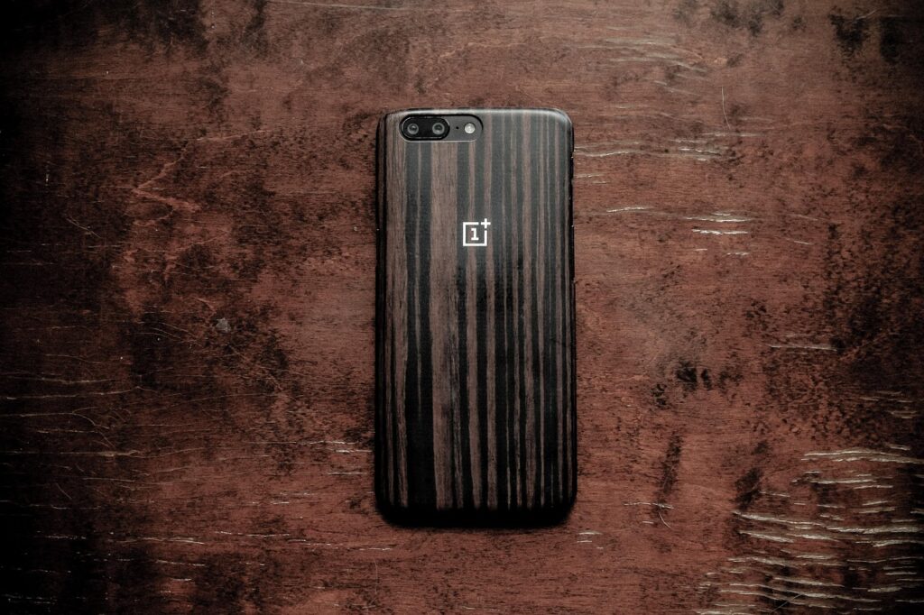 oneplus, oneplus5, oneplus phone, technology, wood, dark wood, wood on wood, mobile phone, telephone, smartphone, user-friendly, mobile-optimization, ux, one plus, brown phone, brown mobile, brown smartphone, brown telephone, oneplus, oneplus, oneplus, oneplus, one plus, one plus, one plus, one plus, one plus